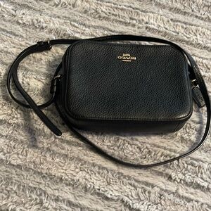 Small Coach crossbody. Black with gold enamel